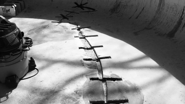 In-ground gunite pool crack repair.