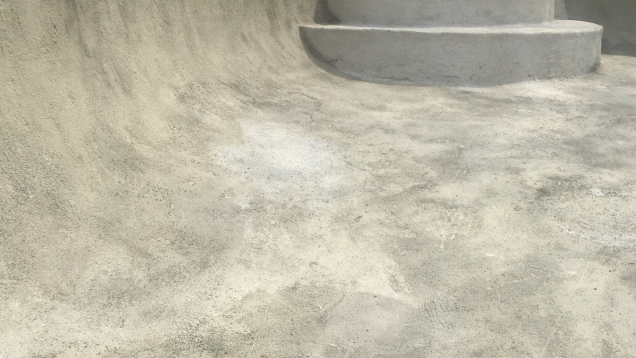 In-progress gunite pool restoration. New plaster has been applied.