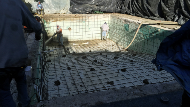 New rebar applied prior to plaster application in gunite pool renovation.