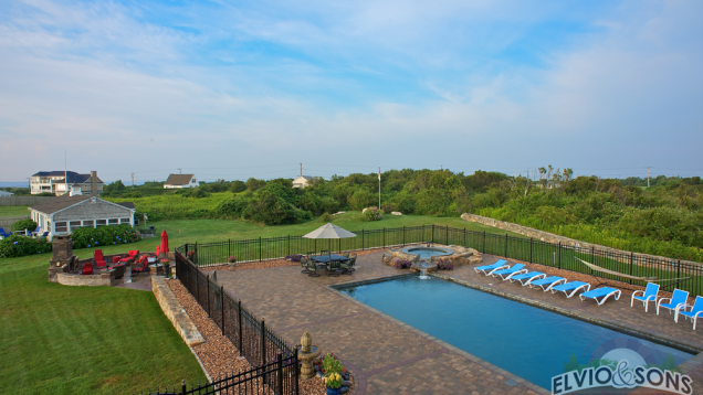 Paver patio with pool,  coping, spa and fireplace.